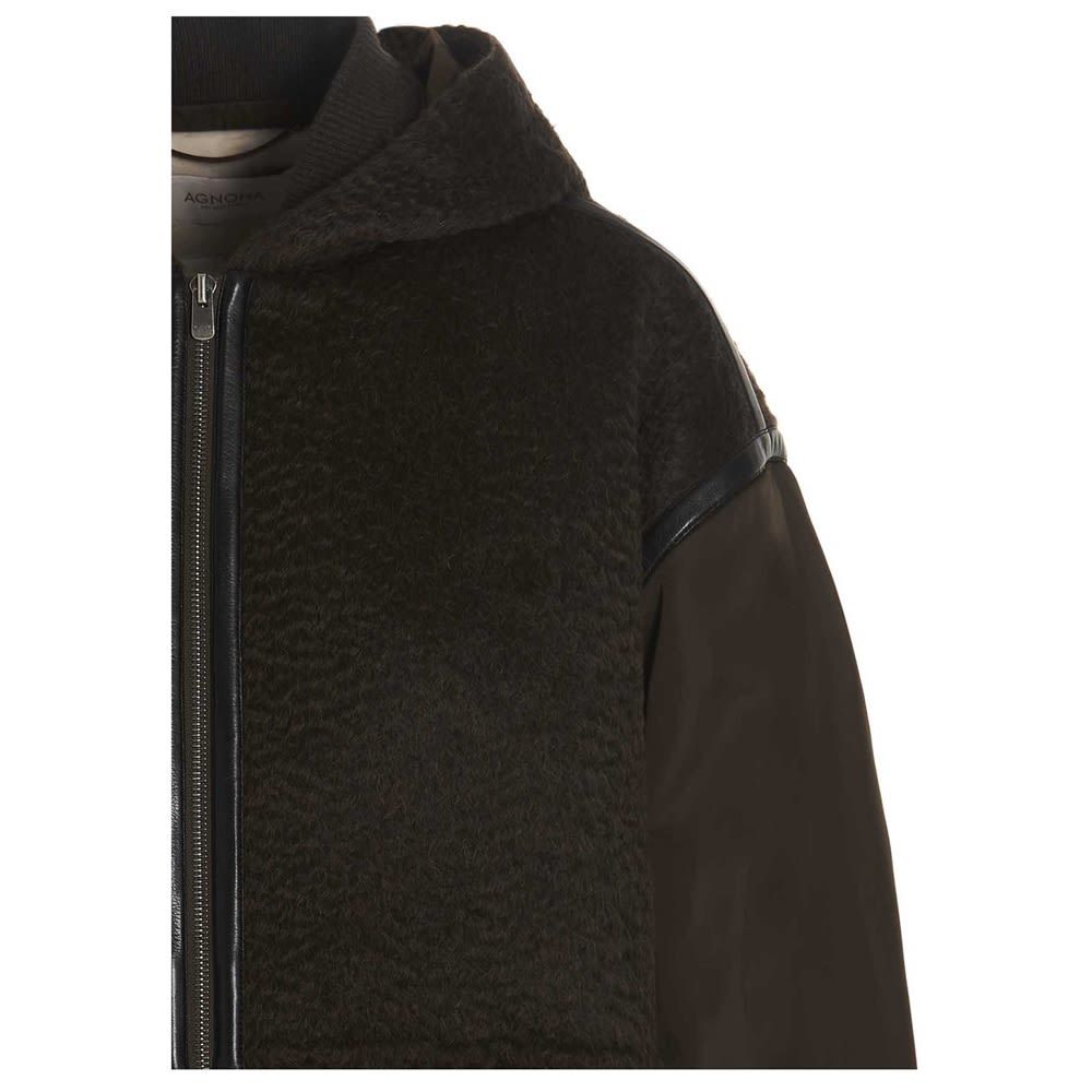 Alpaca wool blend fiber jacket with a fixed hood, a full zip closure, contrasting bovine leather inserts and long cuffed sleeves.