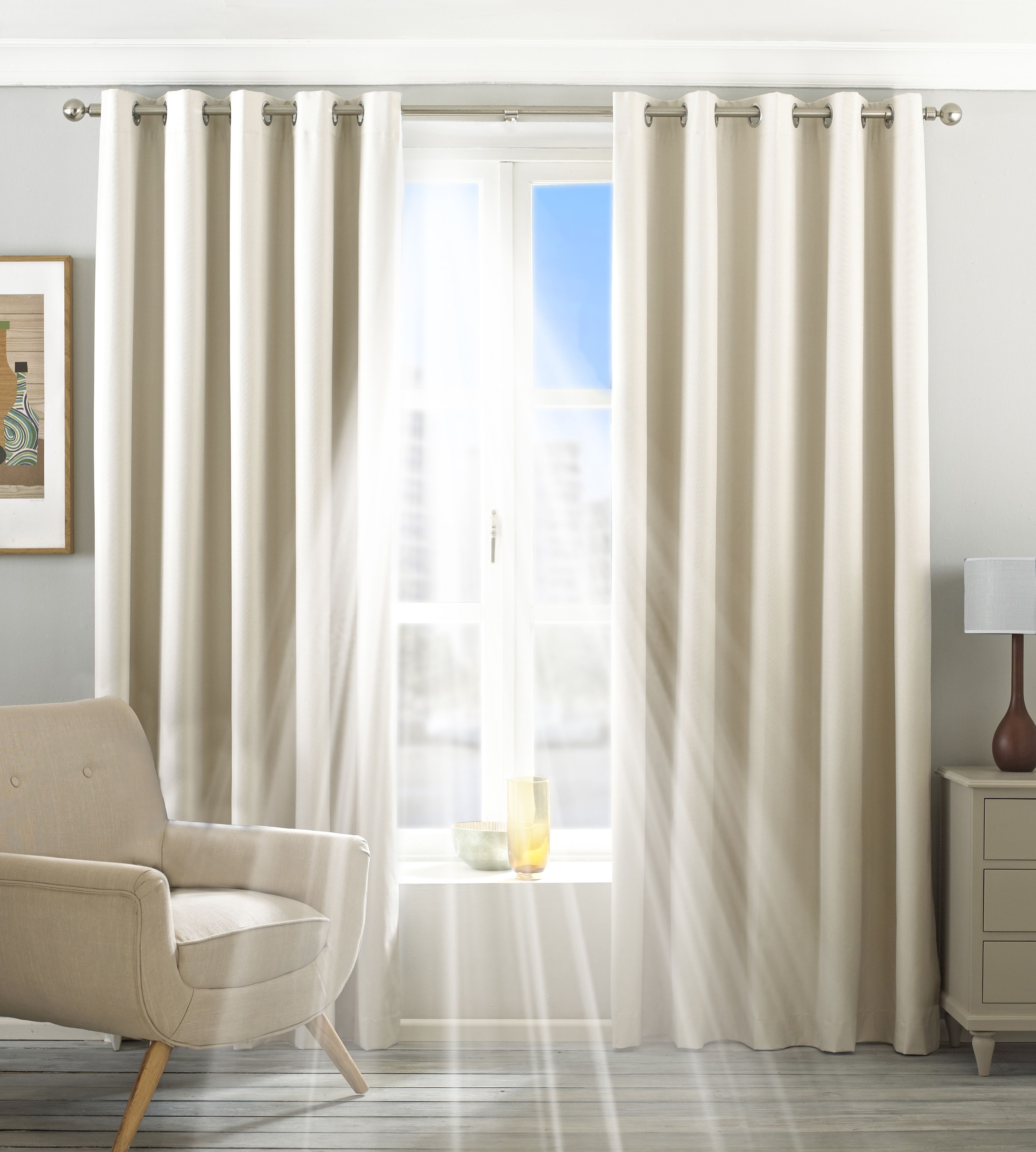 Twilight Blackout Eyelet Curtains in Ivory