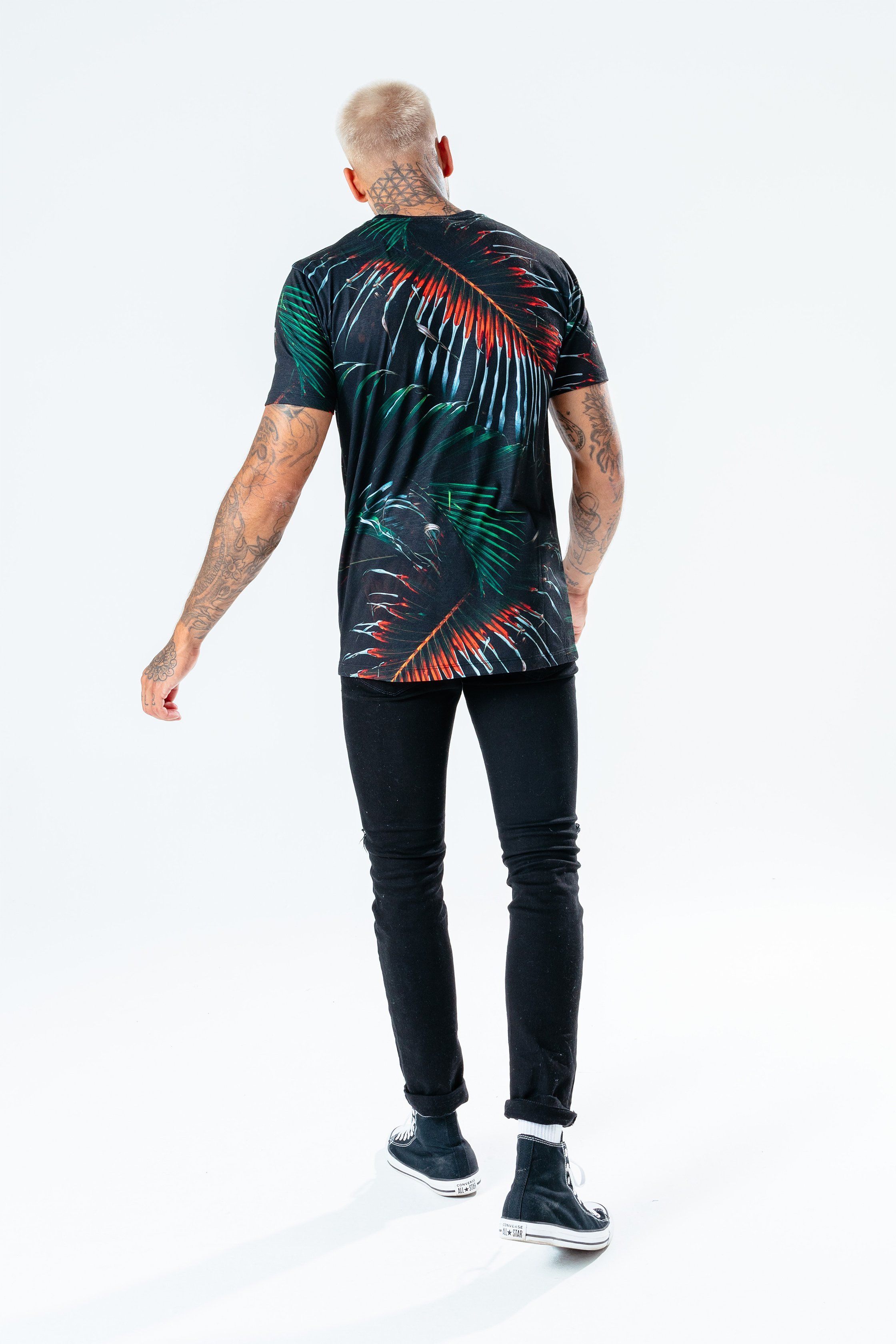 The HYPE. dead palm men's t-shirt pairs perfectly with the HYPE. black men's joggers for a relaxed fit. Coming in with a black, red and green colour palette in an 5% cotton and 95% polyester fabric base for supreme comfort. Designed in our standard men's tee shape, with a crew neckline and short sleeves in an all-over palm tree leaves inspired design. Finished with an embossed woven hem tab. Machine wash at 30 degrees.