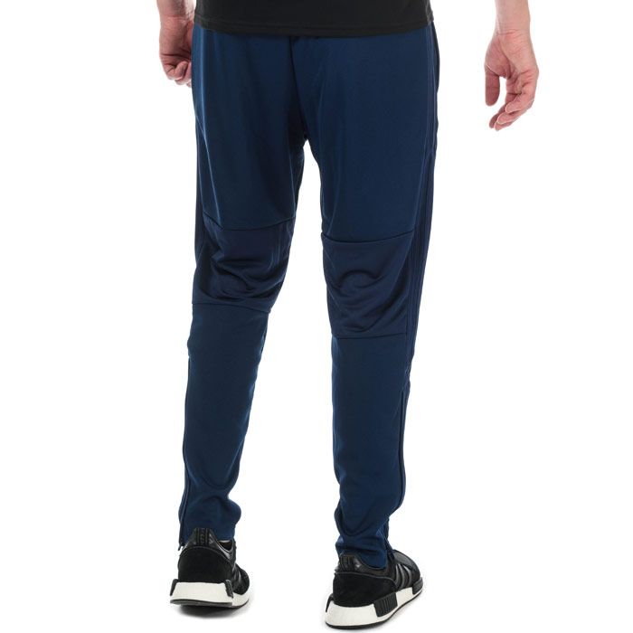 Mens adidas Condivo 18 Low Crotch Training Pants in dark blue - white.<BR><BR>- Elasticated waist with inner drawcord.<BR>- Zipped front welt pockets.<BR>- Low crotch.<BR>- Ventilating mesh panels at back knees.<BR>- Ribbed panels at lower back legs.<BR>- Ankle zips for easy on - off.<BR>- Applied 3-Stripes to sides.<BR>- adidas Badge Of Sport logo below left pocket.<BR>- Tapered leg.<BR>- Slim fit.<BR>- Main material: 100% Polyester.  Machine washable.<BR>- Ref: ED5913