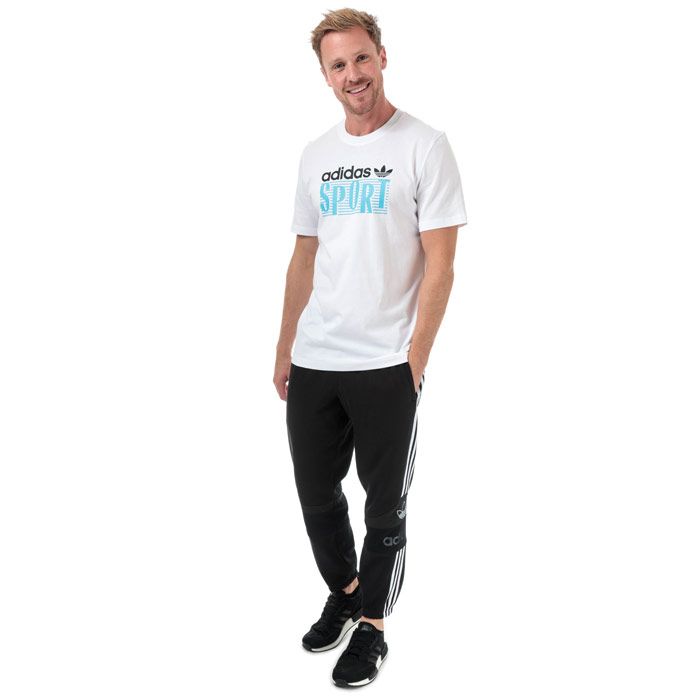 Mens adidas Originals Team Signature Trefoil Jog Pants in black.<BR><BR>- Elasticated waistband with inner drawcord and embroidered Trefoil logo patch.<BR>- Side welt pockets.<BR>- Applied 3-Stripes to sides.<BR>- Mesh overlay panels with adidas Originals branding.<BR>- Elasticated cuffs.<BR>- Tapered leg.<BR>- Regular fit.<BR>- Inside leg length measures 29“ approximately.  <BR>- Main material: 77% Cotton  23% Recycled polyester.  Machine washable.<BR>- Ref: ED7117<BR><BR>Measurements are intended for guidance only.