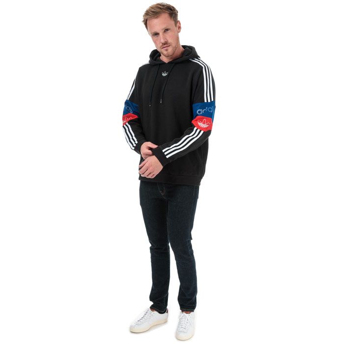 Mens adidas Originals Team Signature Trefoil Hoody in black - core red - collegiate royal.<BR><BR>- Drawcord-adjustable hood.<BR>- Long sleeves with applied 3-Stripes.<BR>- Contrast panels with adidas Originals branding.<BR>- Embroidered Trefoil logo patch to chest.<BR>- Side welt pockets.<BR>- Ribbed cuffs and hem.<BR>- Regular fit.<BR>- Measurement from shoulder to hem: 29“ approximately.  <BR>- Main material: 77% Cotton  23% Recycled polyester.  Rib: 95% Cotton  5% Elastane.  Machine washable.<BR>- Ref: ED7173<BR><BR>Measurements are intended for guidance only.
