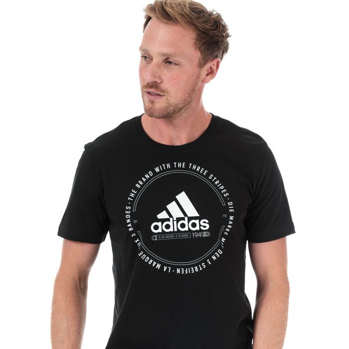 Mens adidas Must Haves Emblem T-Shirt in black.<BR><BR>- Ribbed crew neck.<BR>- Short sleeves.<BR>- Oversize adidas graphic printed to front.<BR>- Tonal back neck tape.<BR>- Regular fit.<BR>- Measurement from shoulder to hem: 30“ approximately.  <BR>- Main material: 100% Cotton.  Rib: 95% Cotton  5% Elastane.  Machine washable.<BR>- Ref: ED7273<BR><BR>Measurements are intended for guidance only.