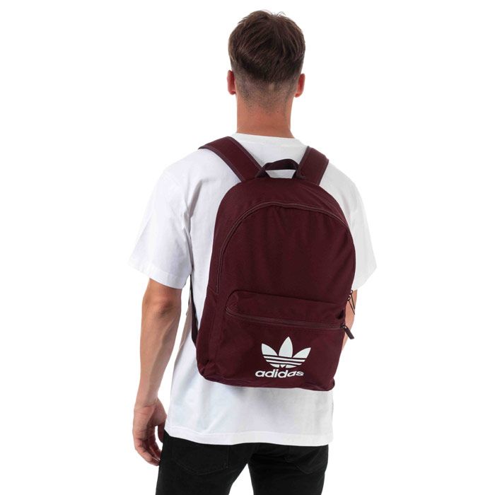 adidas Originals Adicolor Classic Backpack in Maroon.<BR><BR>- One main zip compartment.<BR>- Front zip pocket.<BR>- Padded shoulder straps.<BR>- Carry handle to top.<BR>- Inner laptop sleeve and padded back. <BR>- Trefoil logo to front panel.<BR>- Depth 14cm  Width 31cm  Length 46cm approximately.<BR>- Outer: 100% Polyester. Padding: 100% Polyethylene.<BR>- Ref: ED8669<BR><BR>Measurements are intended for guidance only.