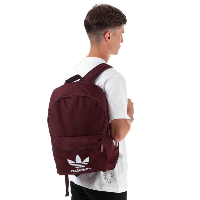 adidas Originals Adicolor Classic Backpack in Maroon.<BR><BR>- One main zip compartment.<BR>- Front zip pocket.<BR>- Padded shoulder straps.<BR>- Carry handle to top.<BR>- Inner laptop sleeve and padded back. <BR>- Trefoil logo to front panel.<BR>- Depth 14cm  Width 31cm  Length 46cm approximately.<BR>- Outer: 100% Polyester. Padding: 100% Polyethylene.<BR>- Ref: ED8669<BR><BR>Measurements are intended for guidance only.
