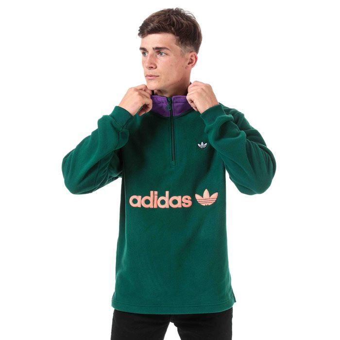 Mens adidas Samstag Colourblock Half Zip Sweat  Green. <BR><BR>- Regular fit is not tight and not loose  the perfect in-between fit. <BR>- Stand-up collar. <BR>- Long sleeves with ribbed cuffs. <BR>- Half zip. <BR>- 100% polyester. Machine washable.<BR>- Ref: EI6362.