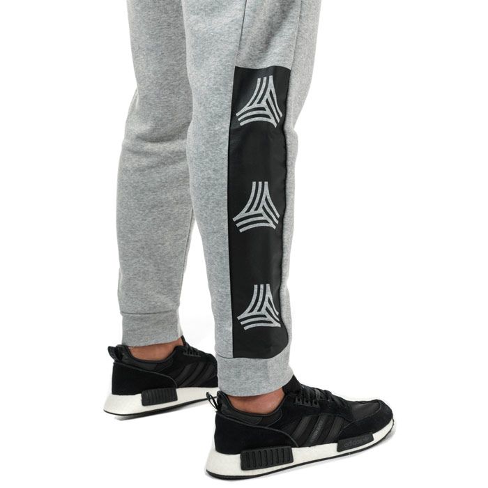 Mens adidas TAN Jog Pants in medium grey heather.<BR><BR>- Elasticated waist with drawcord.<BR>- Zipped front welt pockets.<BR>- Ribbed cuffs.<BR>- adidas brandmark below left pocket.<BR>- Repeat TAN logo at lower right leg.<BR>- Tapered leg.<BR>- Tapered slim fit.<BR>- 77% Cotton  23% Recycled polyester. Machine washable.<BR>- Ref: EJ0946
