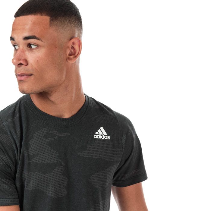 Mens adidas Freelift Camo Burnout T-Shirt in black.<BR><BR>- Lightweight  sweat-wicking training t-shirt.<BR>- climalite® fabric sweeps sweat away from your skin.<BR>- FreeLift Pattern offers a supportive  contoured fit for full range of movement and stay-put coverage.<BR>- Crew neck. <BR>- Short sleeves.<BR>- Slight droptail hem for extra coverage.<BR>- Tonal back neck tape.<BR>- Allover burnout camouflage design.<BR>- adidas Badge Of Sport logo printed at left chest.<BR>- Regular fit.<BR>- 71% Polyester  29% Viscose.  Machine washable.<BR>- Ref: EJ7228