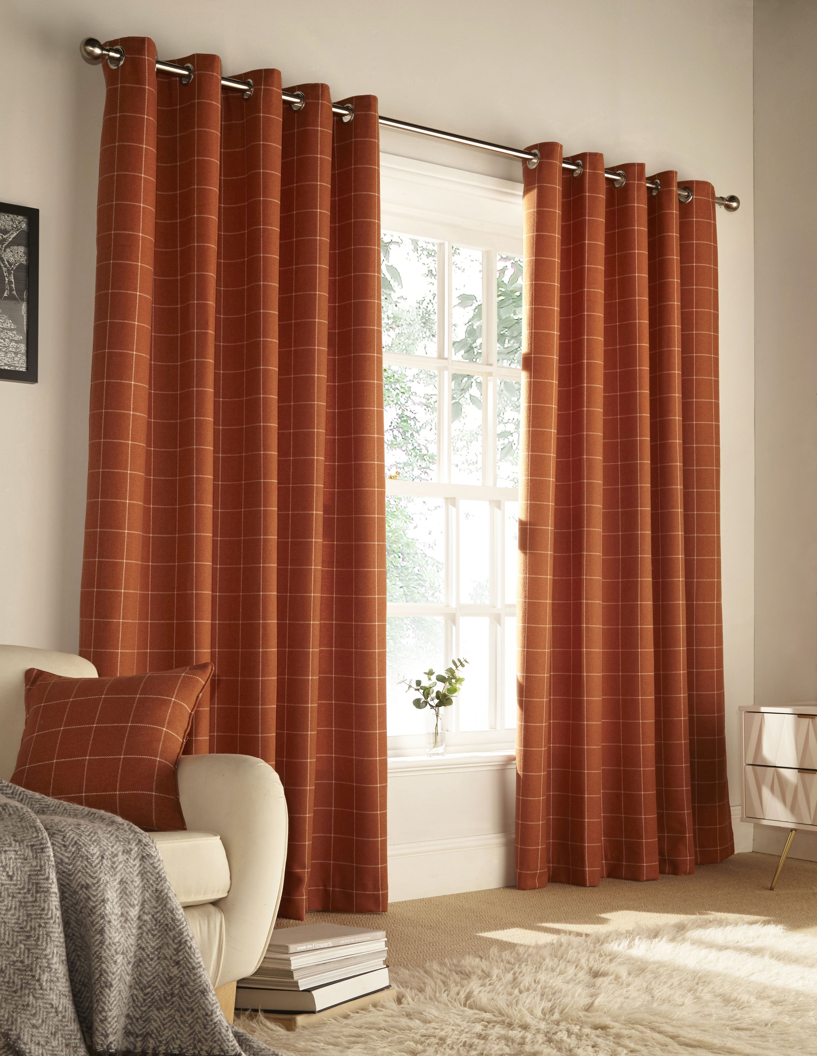 Add a cosy yet contemporary look to your décor with this modern and classic curtain set, which features a windowpane check design. Made with a luxurious lightweight wool-like woven fabric holds outstanding durability and wrinkle resistance as well as having strong rustic colours that will compliment any interior. These curtains are perfect to keep your home warm in winter and cool in summer.
