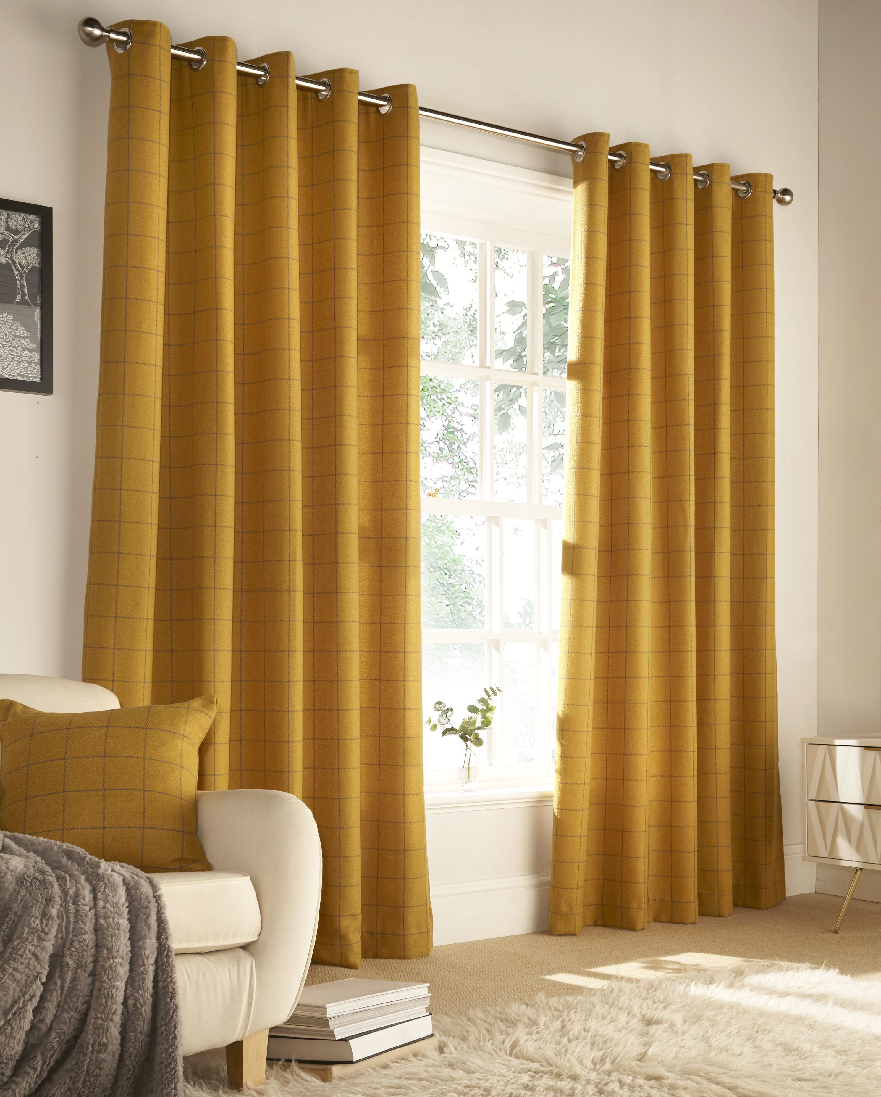 Add a cosy yet contemporary look to your décor with this modern and classic curtain set, which features a windowpane check design. Made with a luxurious lightweight wool-like woven fabric holds outstanding durability and wrinkle resistance as well as having strong rustic colours that will compliment any interior. These curtains are perfect to keep your home warm in winter and cool in summer.