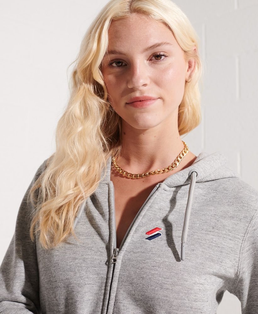 You know how to take your style to the next level. Why not add to that with the Code Essential Zip Hoodie. A flexible addition to your streetwise wardrobe, pair it up how you like and be creative with a bold look that shows your youthful and fearless spirit.Loose Fit – where comfort meets cool, a stylish loose cut makes this a must-have shapeDrawcord hoodZip fasteningTwo pocketsStretch side panelsRibbed cuffs and hemBrushed liningOrganic cottonEmbroidered Code logoSignature logo patchMade with organic cotton grown using natural rather than chemical pesticides and fertilisers. The healthier soil this creates uses up to 80% less water which is better for our planet and for the farmers who grow it.