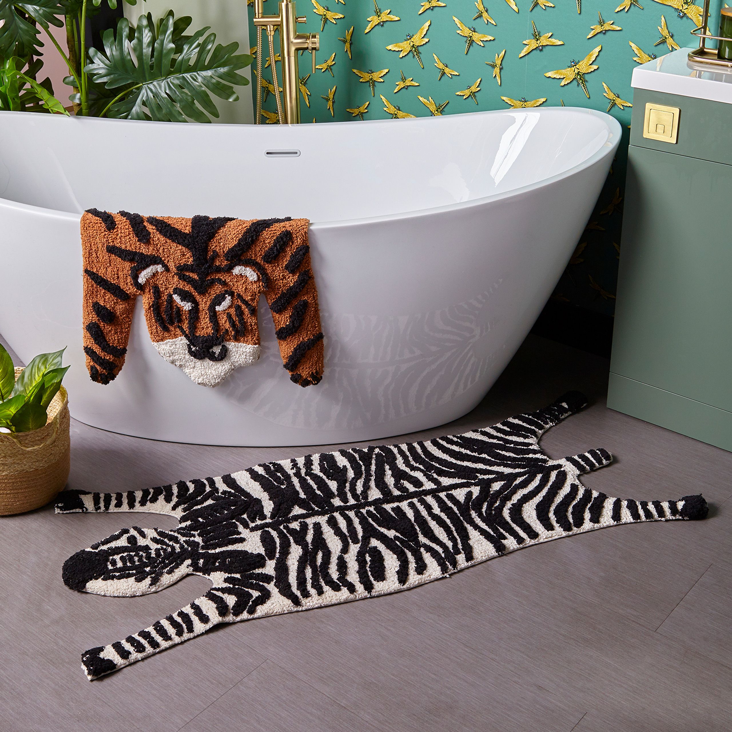 Featuring a bold zebra-shaped design, in a stylish monochrome colour palette. Made from 100% Cotton, making this bath mat incredibly soft under foot. This bath mat has an anti-slip quality, keeping it securely in place on your bathroom floor. The 1800 GSM ensures this bath mat is super absorbent preventing post-bath or shower puddles.