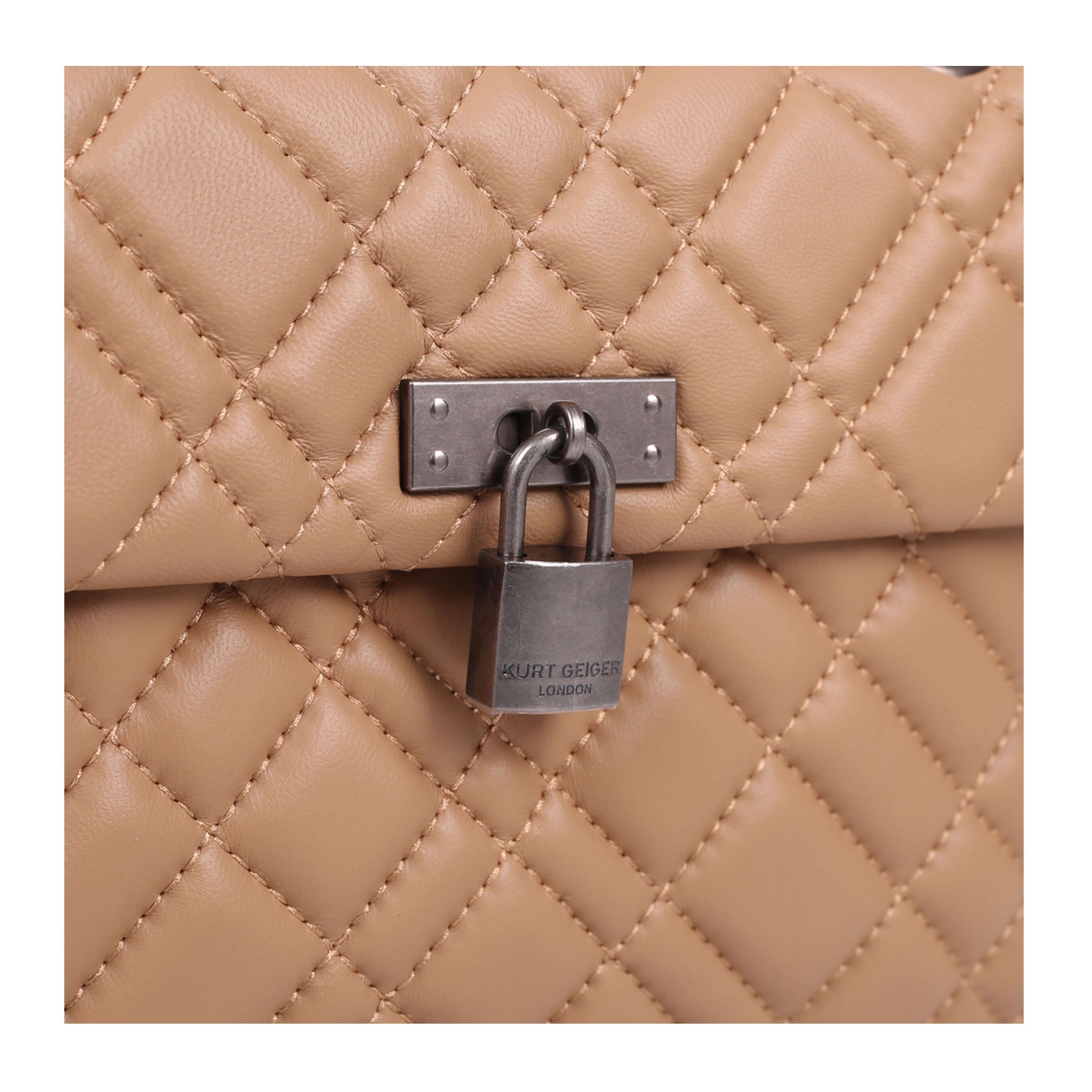 KGL Brixton Lock Bag is a leather quilted bag in camel, with the option of wearing on the shoulder or across the body.