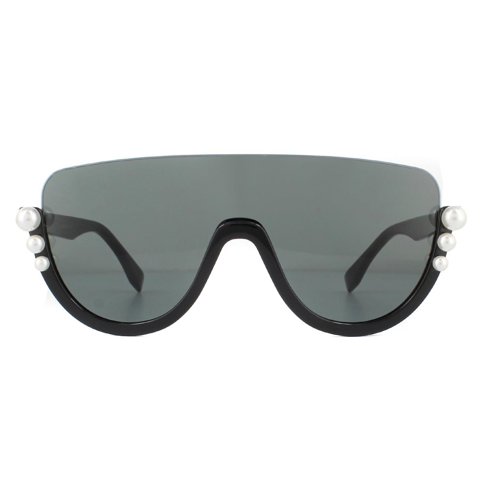 Fendi Sunglasses FF0296/S 807 IR Black Grey are a truly unique style with an upside down style design with the frame at the bottom and rimless at the top. 3 decreasing size pearls feature at the sides for a luxury embellishment.