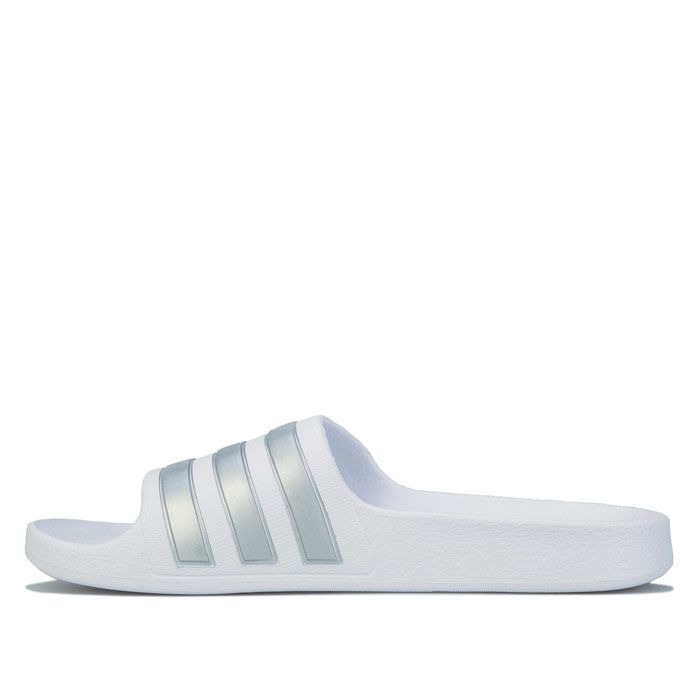 Junior adidas Originals Adilette Slip Sandals in white.<BR><BR>- Synthetic upper.<BR>- Single bandage upper with signature 3-Stripes.<BR>- Slip-on construction.<BR>- Soft Cloudfoam footbed.<BR>- One-piece moulded EVA upper.<BR>- EVA outsole.<BR>- Synthetic upper  Textile and synthetic lining  Synthetic sole.<BR>- Ref.: F35555