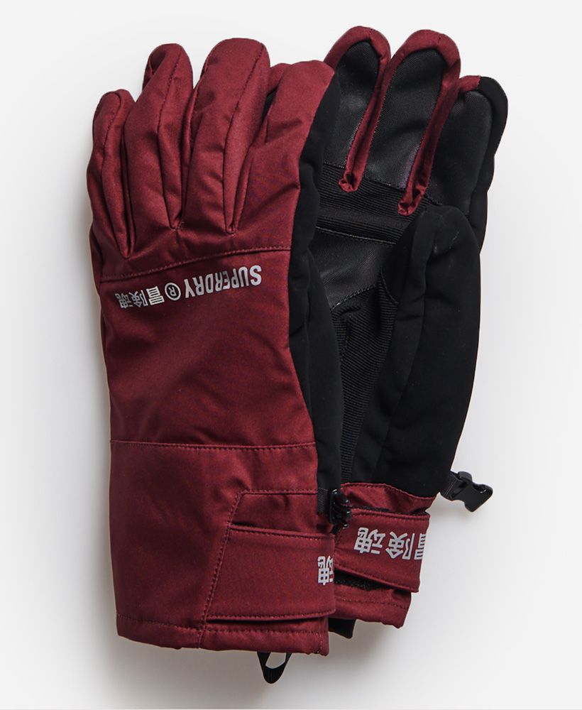 Essential for your ski trip, the Snow gloves are designed to keep you safe with reflective detailing enabling you to be visible at all times. Also, features is hook and loop adjuster cuffs designed to keep the snow out and your hands warm and toasty this season.Breathable 20k/MM - PRovides airflow comfort for very high-level activityWaterproof 20k/MM - Waterproof under high pressure, for heavy rain and wet snowAnti scuff detailing to palm and fingertipsAdjustable hook and loop cuffsSoft, padded liningClip fasteningReflective detailingPrinted Superdry logoSignature Japanese character