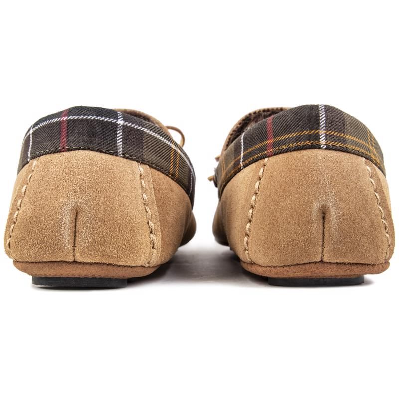 Bring The Cosy Country Style In With These Tan Barbour Slippers Tueart, Featuring Soft Suede Uppers, Warm Faux-fur Inner Lining And Flexible Rubber Soles. They're Designed With A Moccasin Construction And A Stylish Barbour Metal Logo For A Traditional, Luxurious Look.