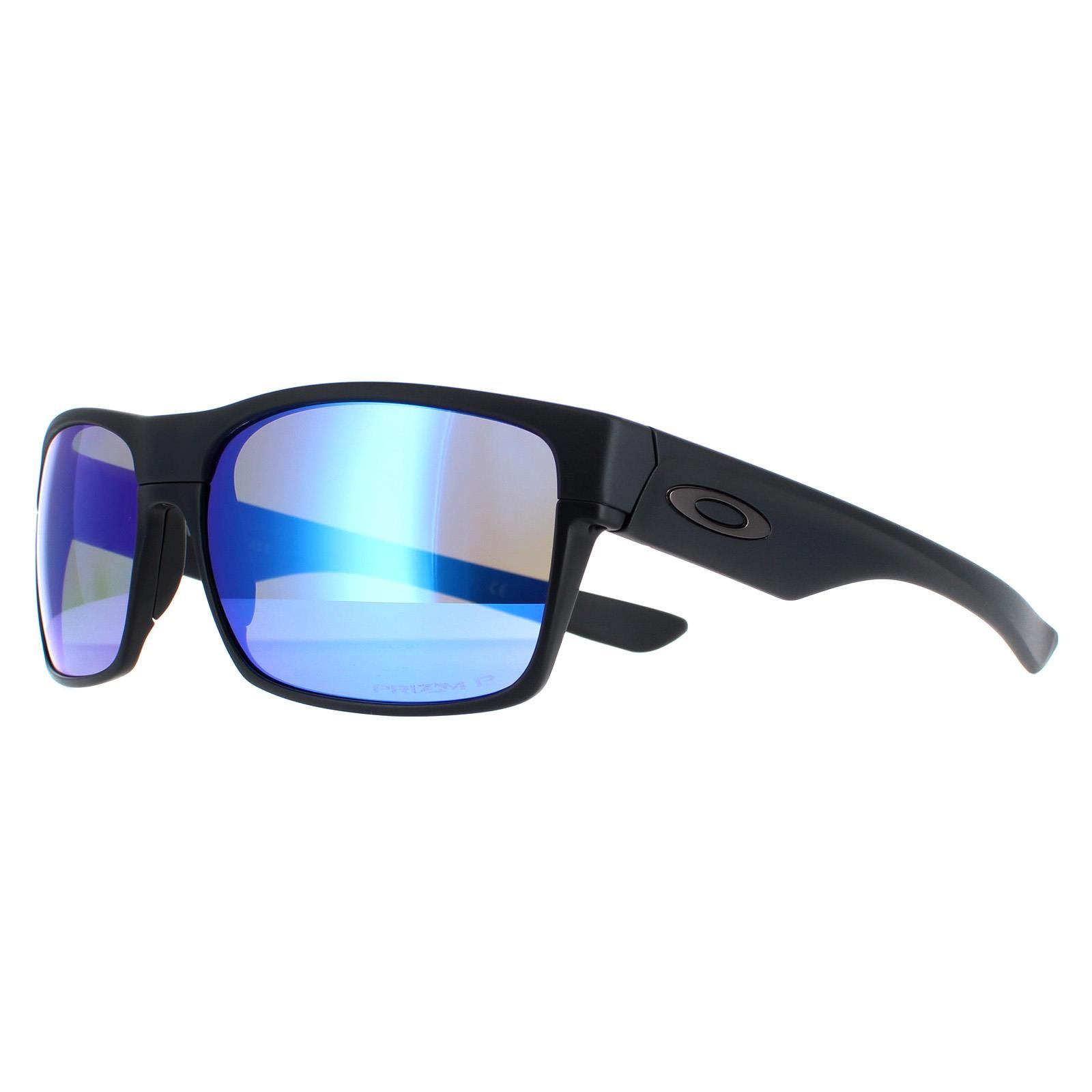 Oakley Rectangle Mens Matte Black Prizm Sapphire Polarized  TwoFace  Sunglasses literally a two-tone frame with an aluminium lower frame and O Matter upper frame. Classic styling and the usual quality lenses from Oakley combine to give a winning pair of ultra modern sunglasses.
