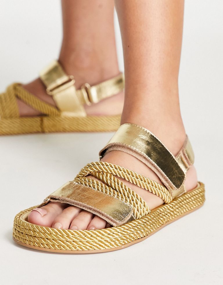 Sandals by ASOS DESIGN Free your feet Adjustable straps Adhesive fastening Open toe Flat sole Sold By: Asos