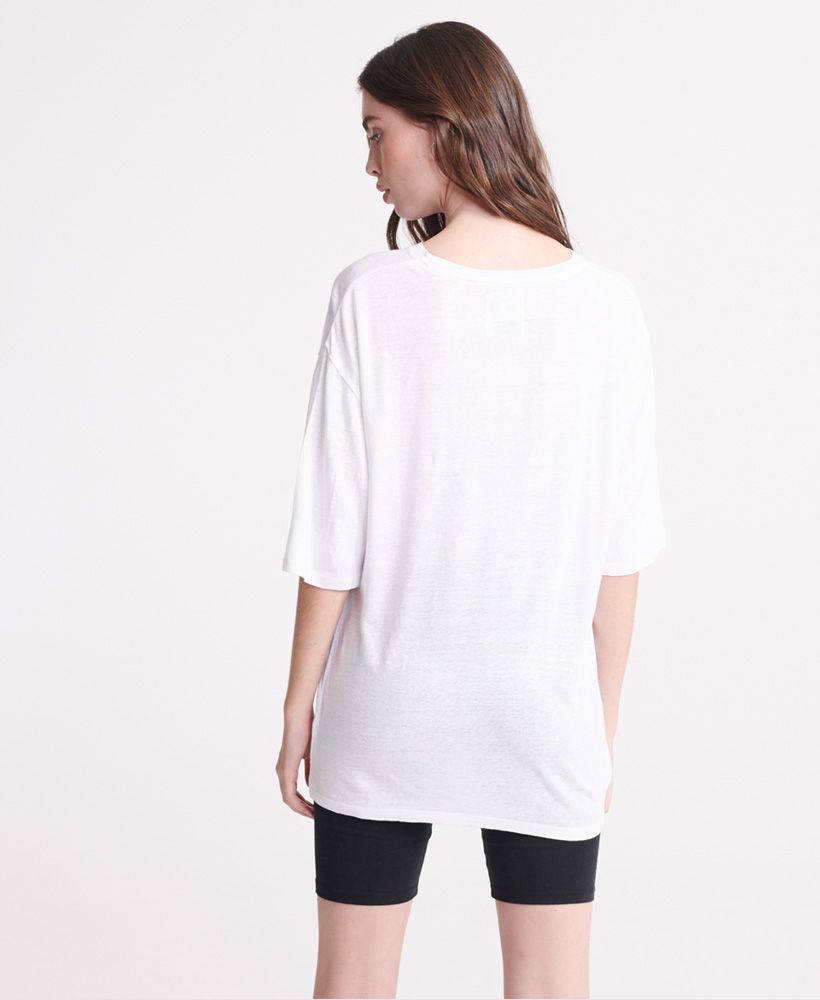 Superdry women's Desert Linen T-shirt. This linen blend tee features a ribbed neckline, oversized fit and short sleeves. Finished with a Superdry logo tab on the hemline.