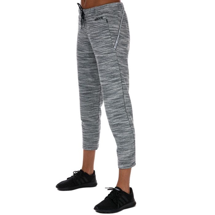 Womens adidas Xpressive 7-8 Joggers in grey black.- Elasticated waistband with drawstring fastening.- Seven-eighth length.- Side zip pockets.- Lightweight.- Cropped construction.- Signature logo and are complete with adidas branding.- Breathable.- Open hems.- Regular fit.- 52% Cotton  48% Polyester (Recycled) . Machine washable. - Ref: EI5508