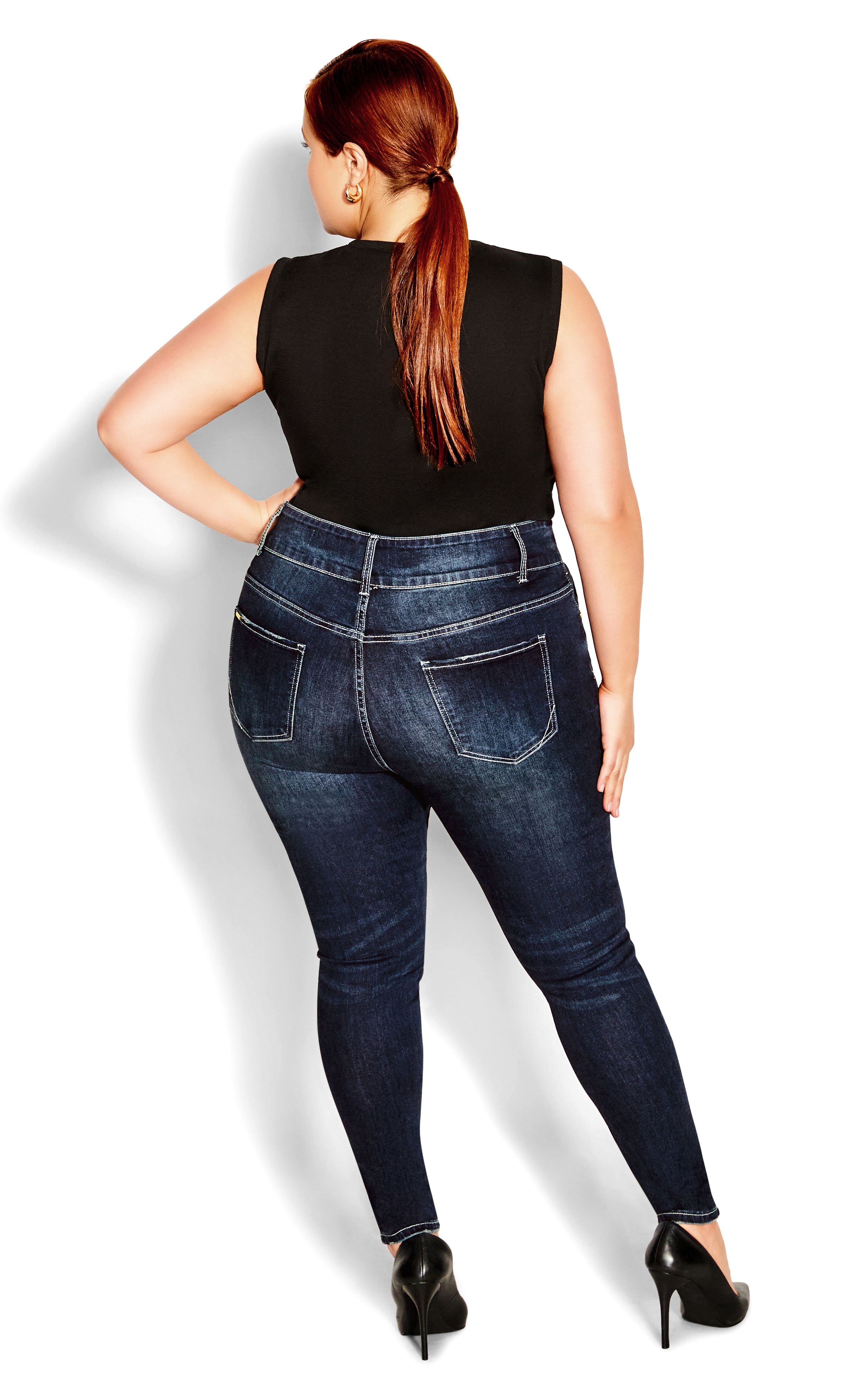 Add a chic touch to your casual outfit with the ripped stylings of our Asha Sassy Rips Jean. Flaunting a stretch denim construction and the perfect fit for an apple body shape, these jeans are a savvy style for your next day out with the girls! Key Features Include: - Asha: the perfect fit for an apple body shape - High rise - Double button & zip fly closure - Belt-looped waistline - 5-pocket denim styling - Stretch cotton blend fabrication - Distressed detail - Skinny leg - High denim fibre retention to maintain shape - Signature Chic Denim hardware throughout zips, buttons and rivets - Full length Glam it up with a wrap top and polished pumps for a smart casual finish.