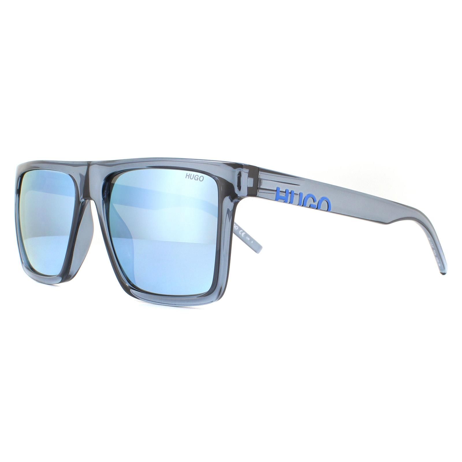 Hugo by Hugo Boss Sunglasses HG 1069/S PJP 3J Crystal Blue Blue Mirror are a large square design made from lightweight acetate. The flat frame top creates a contemporary feel and the temples feature the Hugo logo.