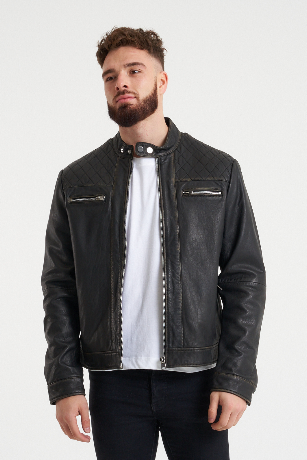 Washed leather, tab neck collar and subtle shoulder quilted stitch - what more could you want from a classic leather jacket? The iconic BARNEYS ORIGINALS James jacket is made from super soft sheep leather that boasts timeless style and prevailing durability. As seen on the likes of Jason Statham, this biker jacket is a must have for any occassion.