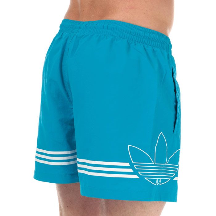 Mens adidas Originals SPRT FB Swim Shorts in shock cyan.<BR><BR>- Elasticated waistband with inner drawcord.<BR>- Front welt pockets.<BR>- Wraparound 3-Stripes print with outline Trefoil graphic.<BR>- Mesh lining.<BR>- Regular fit.<BR>- Shell: 100% Nylon.  Lining: 100% Recycled polyester.  Machine washable.<BR>- Ref: FH6880