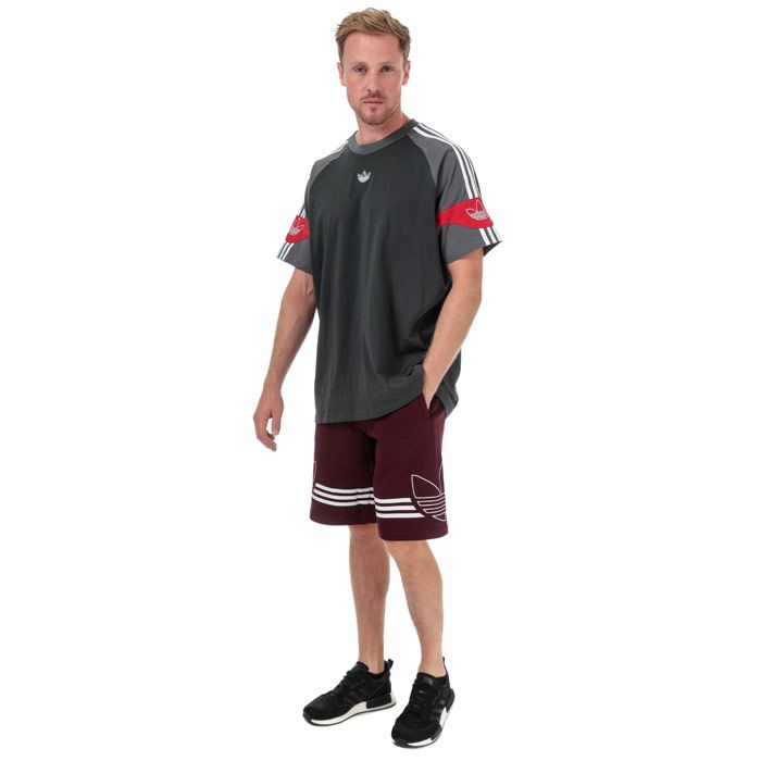 Mens adidas Originals SPRT Football T-Shirt in carbon - grey five.<BR><BR>- Ribbed crew neck.<BR>- Short raglan sleeves.<BR>- Applied 3-Stripes at shoulders and sleeves.<BR>- Contrast sleeve overlays with Trefoil branding.<BR>- Embroidered Trefoil logo patch at centre chest.<BR>- Contrast back neck tape.<BR>- Regular fit.<BR>- Main material: 100% Cotton.  Machine washable.<BR>- Ref: FK1976