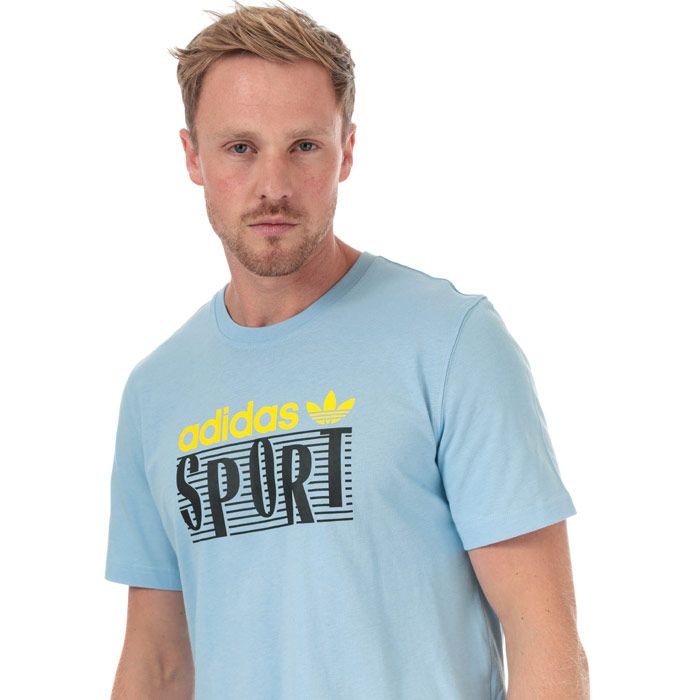 Mens adidas Originals Linear Logo T-Shirt in clear sky.<BR><BR>- Ribbed crew neck.<BR>- Short sleeves.<BR>- Retro-inspired graphic with linear logo printed to front. <BR>- Tonal back neck tape.<BR>- Regular fit.<BR>- Main material: 100% Cotton.  Machine washable.<BR>- Ref: FM3345