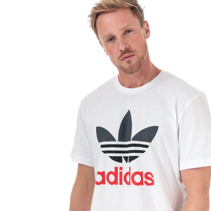 Mens adidas Originals Trefoil T-Shirt in white.<BR><BR>- Ribbed crew neck.<BR>- Short sleeves.<BR>- Soft cotton jersey fabric.<BR>- Large printed Trefoil logo to front.<BR>- Tonal back neck tape.<BR>- Main material: 100% Cotton.  Machine washable.<BR>- Ref: FU18450.170   turkey