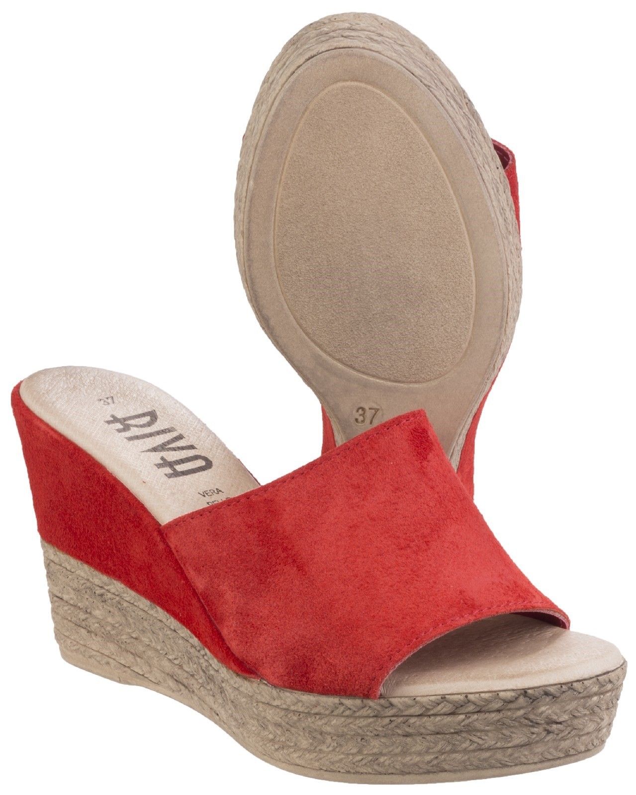 Suede leather Mule with half suede cover wedge and imitation espadrille stitchingSuede leather Mule. 
Half suede cover wedge and imitation espadrille stitching. 
Leather lining.