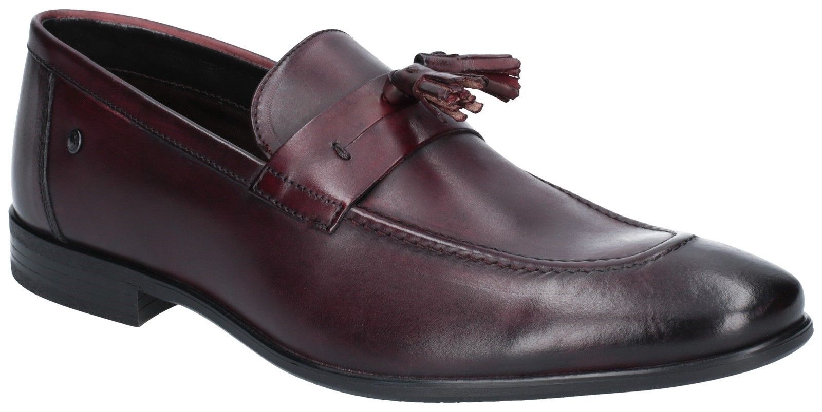 The Ritz Loafer from the Base London Concierge range is a classic slip on. A formal leather shoe providing quality construction with great comfort. The tassel decoration adds extra flair to your look, stating that you take your style seriously. Formal Styling. 
Tassel Details.