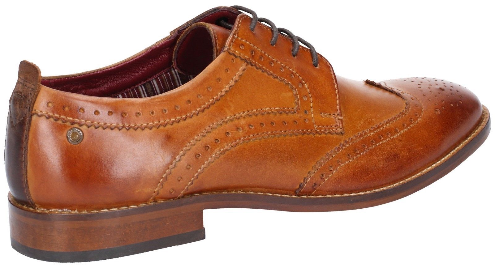 A fierce shoe, made with a durable slim line resin sole and offering a generous heel. From the Base London Spotlight collection, this sharp wing-tip brogue is made from the highest quality leathers and is perfect for all formal occasions. High quality leather upper. 
Slim line Resin sole. 
Brogue detailing.