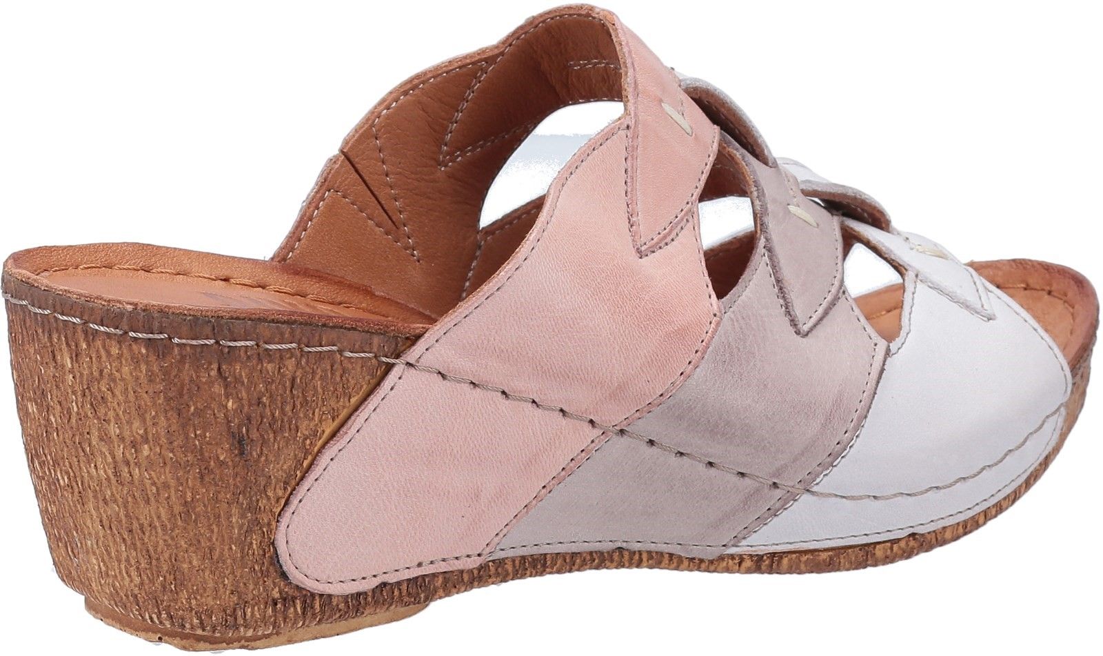 Riva Reus is a womens stylish and lightweight wedge heeled open toe mule sandal featuring tonal coloured leather uppers with cut-out detailing and bark effect textured wedge.