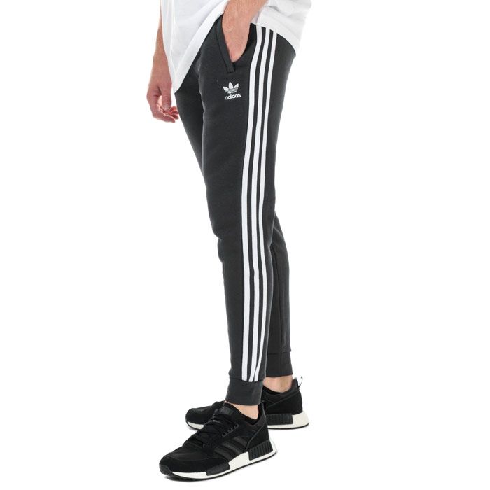 Mens adidas Originals 3-Stripes Pants in carbon.<BR><BR>- Ribbed elasticated waistband with inner drawcord.<BR>- Zipped front welt pockets.<BR>- Applied 3-Stripes to sides.<BR>- Embroidered Trefoil logo at left thigh.<BR>- Ribbed cuffs.<BR>- Tapered leg.<BR>- Slim fit.<BR>- Main material: 77% Cotton  23% Recycled polyester.  Machine washable.<BR>- Ref: GC8801