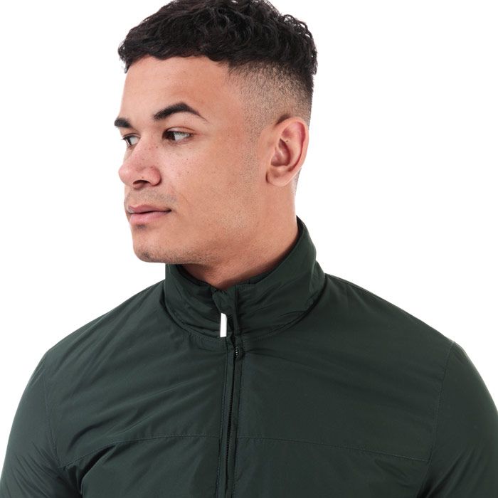 Mens Henri Lloyd Jackets in green.<BR><BR>- Stand up collar with ribbed lining.<BR>- Classic collar.<BR>- Full zip fastening.<BR>- Ribbed cuffs and hem.<BR>- Zipped front pockets.<BR>- Two inner pockets.<BR>- Breathable mesh lining.<BR>- Henri Lloyd branding at front right pocket and back neck.<BR>- 100% Polyester. Machine washable. <BR>- Ref:H4006510935