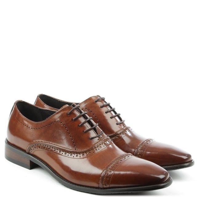 The Daniel Holnest Leather Square Toe Brogue is a staple for your wardrobe this Season. These classic smart shoes are crafted from a premium gloss leather upper with luxurious leather lining. Easy to wear lace up style provides the perfect fit. Raised seaming and top stitching add detail throughout as well as heritage brogue detailing.