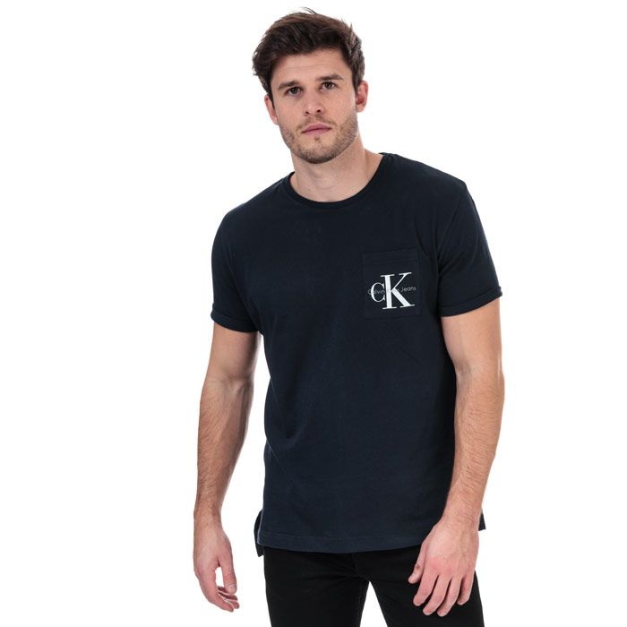 Mens Calvin Klein Logo T- Shirt in blue.<BR><BR>- Ribbed crew neck.<BR>- Short sleeves.<BR>- Calvin Klein logo at the chest pocket.<BR>- Regular fit.<BR>- 100% Cotton.  Machine wash at 30 degrees.<BR>- Ref: J30J304856402