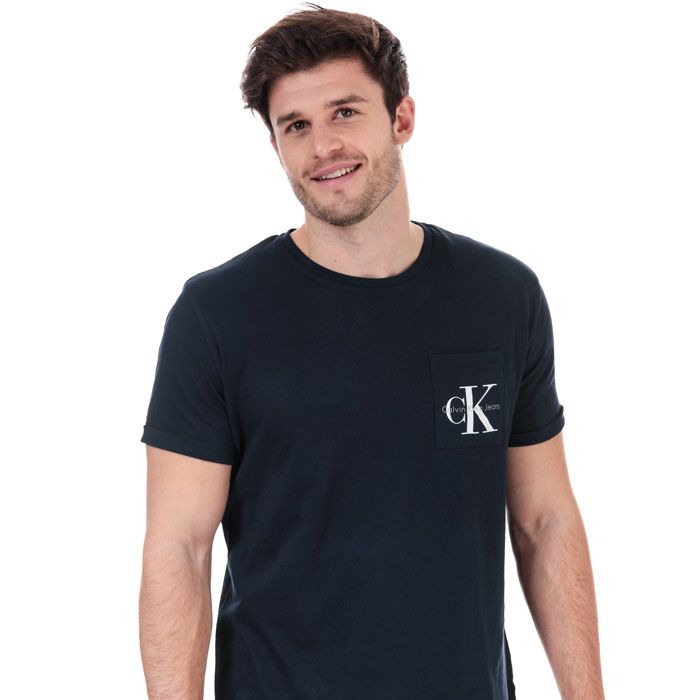 Mens Calvin Klein Logo T- Shirt in blue.<BR><BR>- Ribbed crew neck.<BR>- Short sleeves.<BR>- Calvin Klein logo at the chest pocket.<BR>- Regular fit.<BR>- 100% Cotton.  Machine wash at 30 degrees.<BR>- Ref: J30J304856402