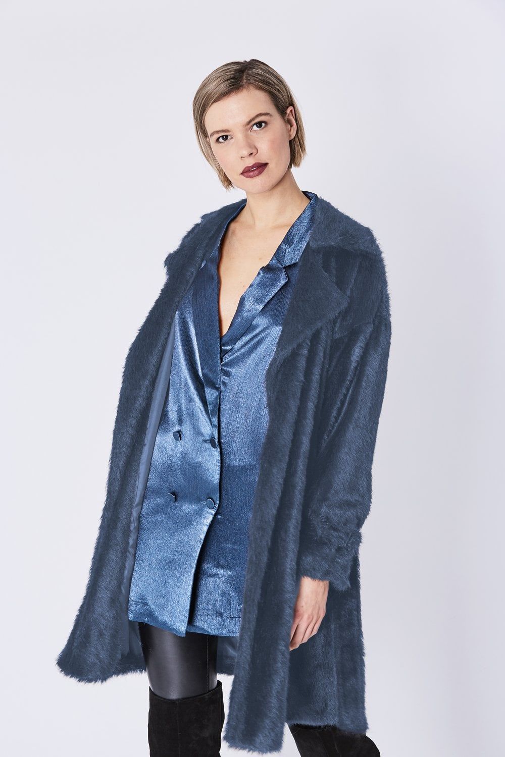 Luxury Faux Fur Coat

15% Acrylic
85% Modacrylic

Lining: 100% Polyester

One Size
Comfortably fits sizes 8 - 14 UK

Add a touch of elegance to your winter wardrobe with this luxurious faux fur coat with a belted waist. An incredibly soft to touch fluffy piece that features double-breasted lapels and a buckle belt. A classic faux fur coat that is essential to your everyday wardrobe.