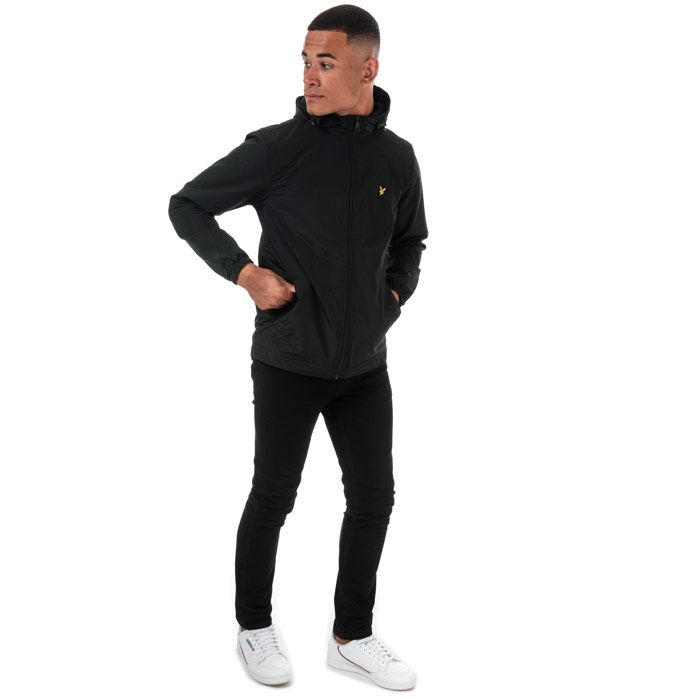 Mens Lyle And Scott Microfleece Lined Zip Through Hooded Jacket in true black.<BR><BR>Lightweight shell jacket with warm microfleece body lining.<BR>- Bungee-adjustable hood.<BR>- Full zip fastening.<BR>- Long sleeves with elasticated cuffs.<BR>- Side welt pockets with snap closure.<BR>- Bungee-adjustable hem.<BR>- Embroidered eagle logo at left chest.<BR>- Shell: 100% Nylon.  Body and sleeve lining: 100% Polyester.  Machine washable.<BR>- Ref: JK921V572