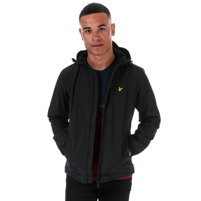 Mens Lyle And Scott Microfleece Lined Zip Through Hooded Jacket in true black.<BR><BR>Lightweight shell jacket with warm microfleece body lining.<BR>- Bungee-adjustable hood.<BR>- Full zip fastening.<BR>- Long sleeves with elasticated cuffs.<BR>- Side welt pockets with snap closure.<BR>- Bungee-adjustable hem.<BR>- Embroidered eagle logo at left chest.<BR>- Shell: 100% Nylon.  Body and sleeve lining: 100% Polyester.  Machine washable.<BR>- Ref: JK921V572