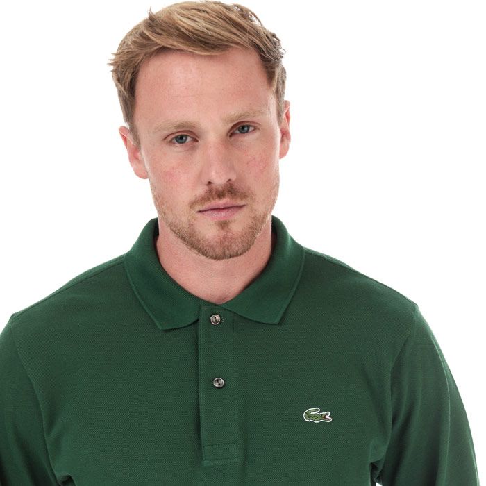 Mens Lacoste Classic Fit Long Sleeve Polo Shirt in green.<BR><BR>- Ribbed polo collar.<BR>- Two button placket.<BR>- Long sleeves with ribbed cuffs.<BR>- Tonal back neck tape.<BR>- Signature crocodile logo applied at left chest.<BR>- Soft and comfortable cotton piqué fabric.<BR>- Classic fit.<BR>- 100% Cotton.  Machine washable.<BR>- Ref: L1312-00-ZCA
