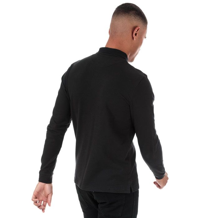 Mens Lyle And Scott Long Sleeve Polo Shirt in true black.<BR><BR>- Ribbed polo collar.<BR>- Three button placket.<BR>- Long sleeves with ribbed cuffs.<BR>- Even vented hem.<BR>- Embroidered eagle logo at left chest.<BR>- Woven herringbone back neck tape.<BR>- Regular fit.<BR>- 100% Cotton piqué.  Machine washable.<BR>- Ref: LP400VB572