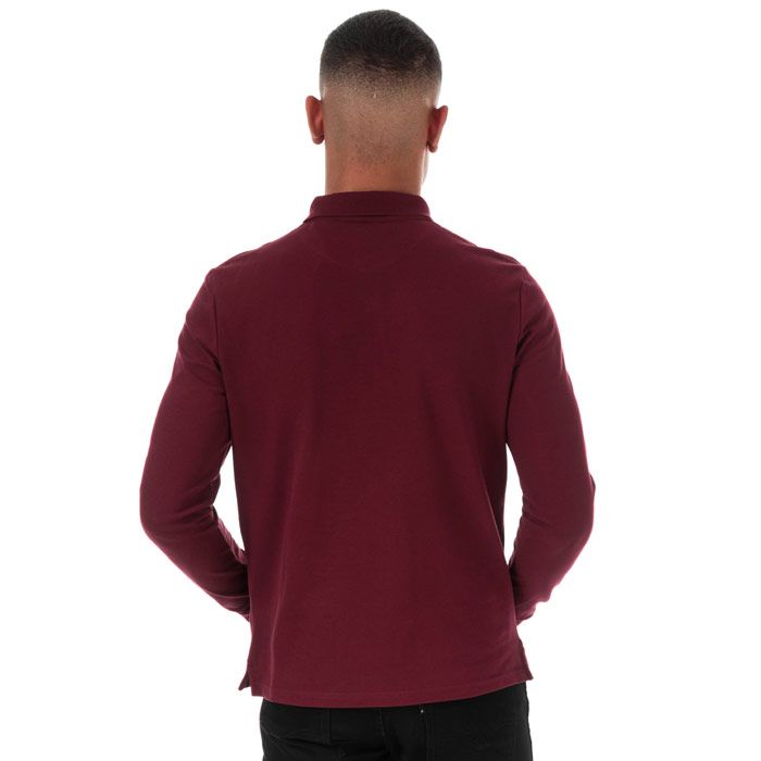 Mens Lyle And Scott Long Sleeve Polo Shirt in claret jug.<BR><BR>- Ribbed polo collar.<BR>- Three button placket.<BR>- Long sleeves with ribbed cuffs.<BR>- Even vented hem.<BR>- Embroidered eagle logo at left chest.<BR>- Woven herringbone back neck tape.<BR>- Regular fit.<BR>- 100% Cotton piqué.  Machine washable.<BR>- Ref: LP400VTR477