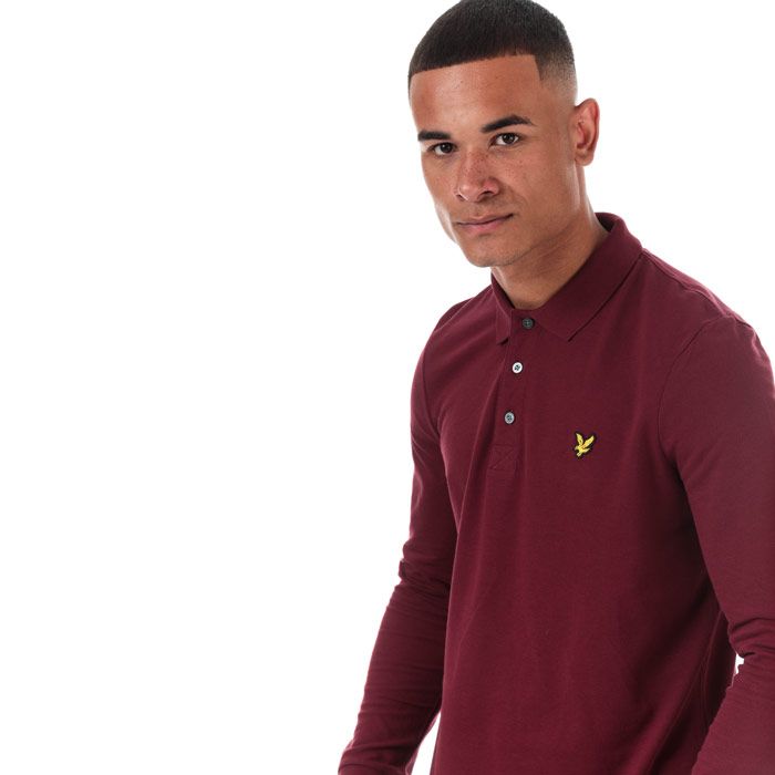 Mens Lyle And Scott Long Sleeve Polo Shirt in claret jug.<BR><BR>- Ribbed polo collar.<BR>- Three button placket.<BR>- Long sleeves with ribbed cuffs.<BR>- Even vented hem.<BR>- Embroidered eagle logo at left chest.<BR>- Woven herringbone back neck tape.<BR>- Regular fit.<BR>- 100% Cotton piqué.  Machine washable.<BR>- Ref: LP400VTR477