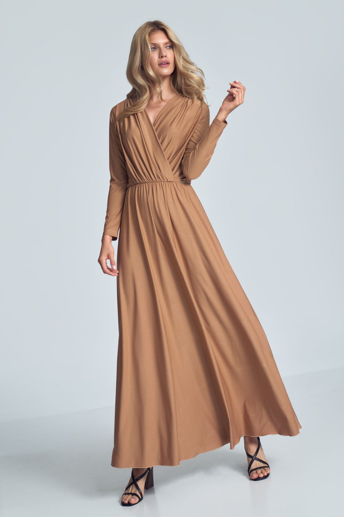 Beige maxi dress with long sleeves, wrap creased neckline, elasticated band sewn in the waist.