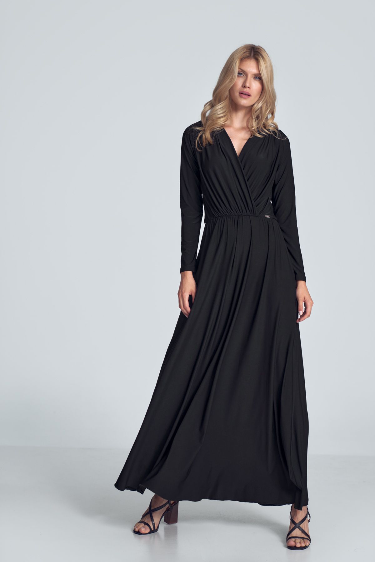 Black maxi dress with long sleeves, wrap creased neckline, elasticated band sewn in the waist.